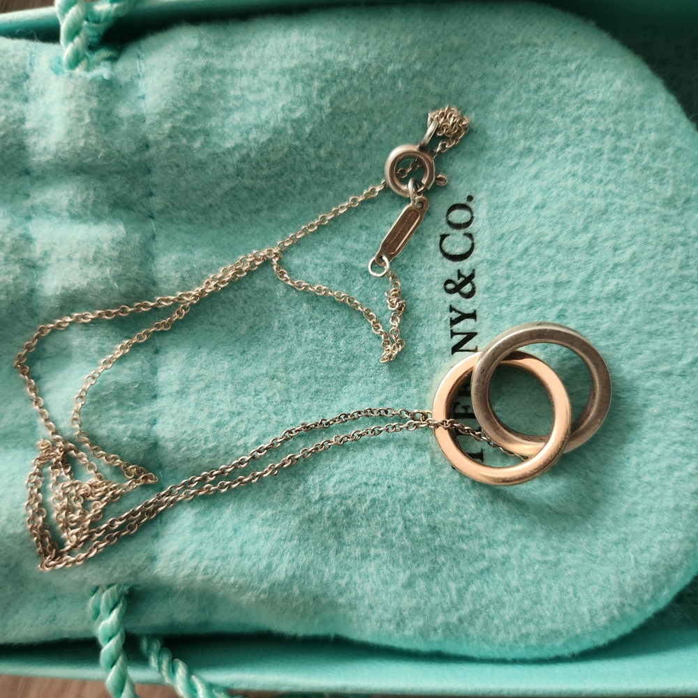 Tiffany & Co. Silver and Gold Interlocking Necklace
